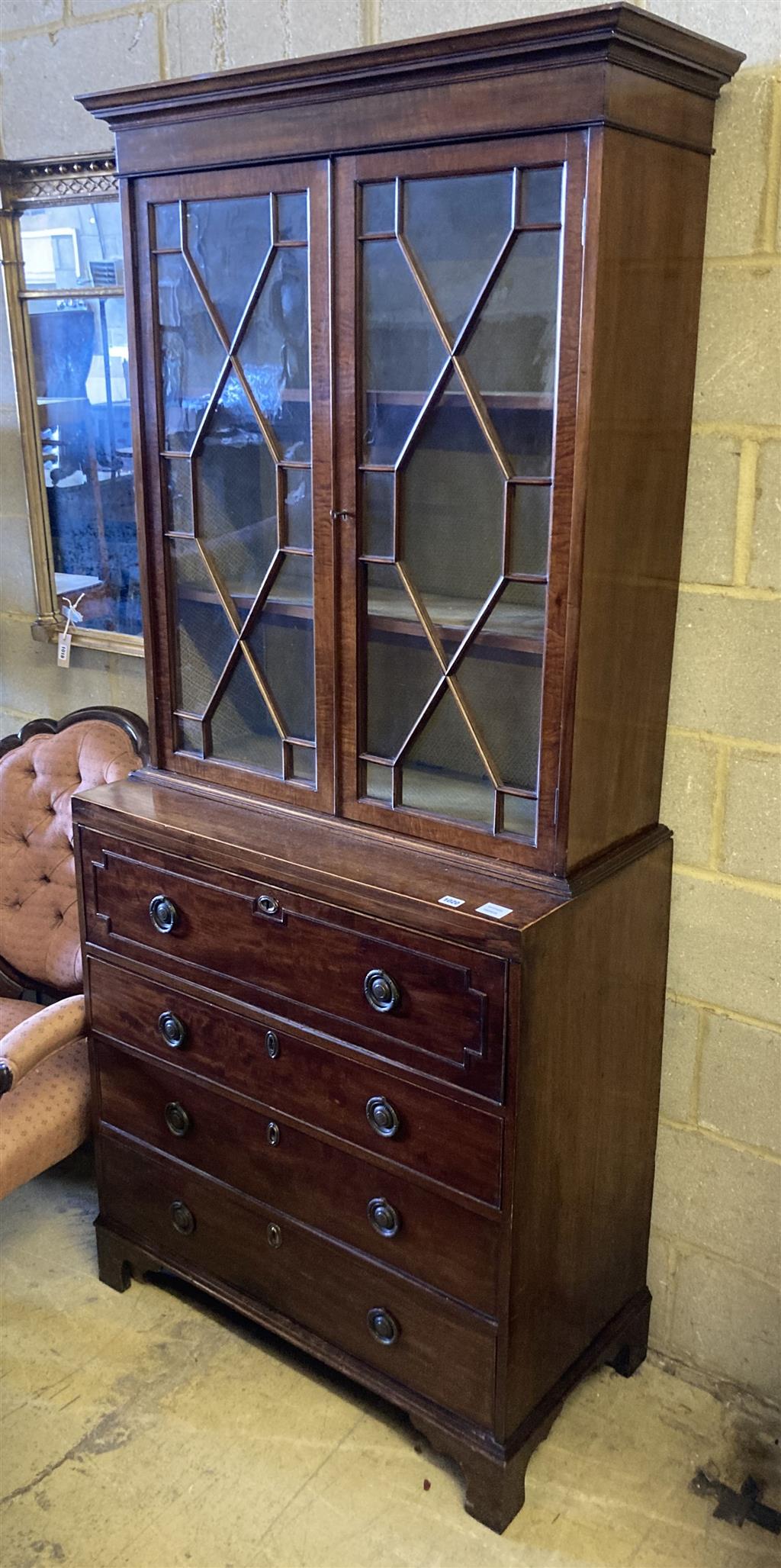 A George III Sheraton style mahogany secretaire bookcase, width 91cm, depth 46cm, height 208cm
